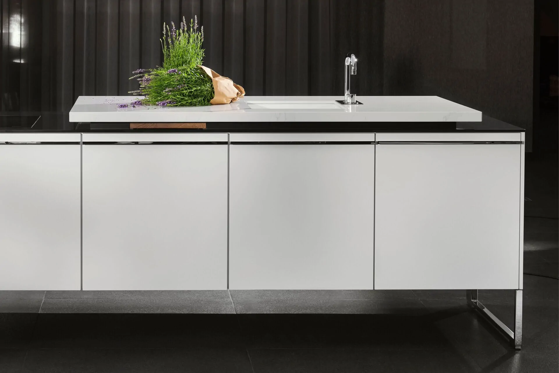 Poggenpohl +VENOVO kitchen with free-positioned elements, side-frame cabinetry, and smooth surfaces