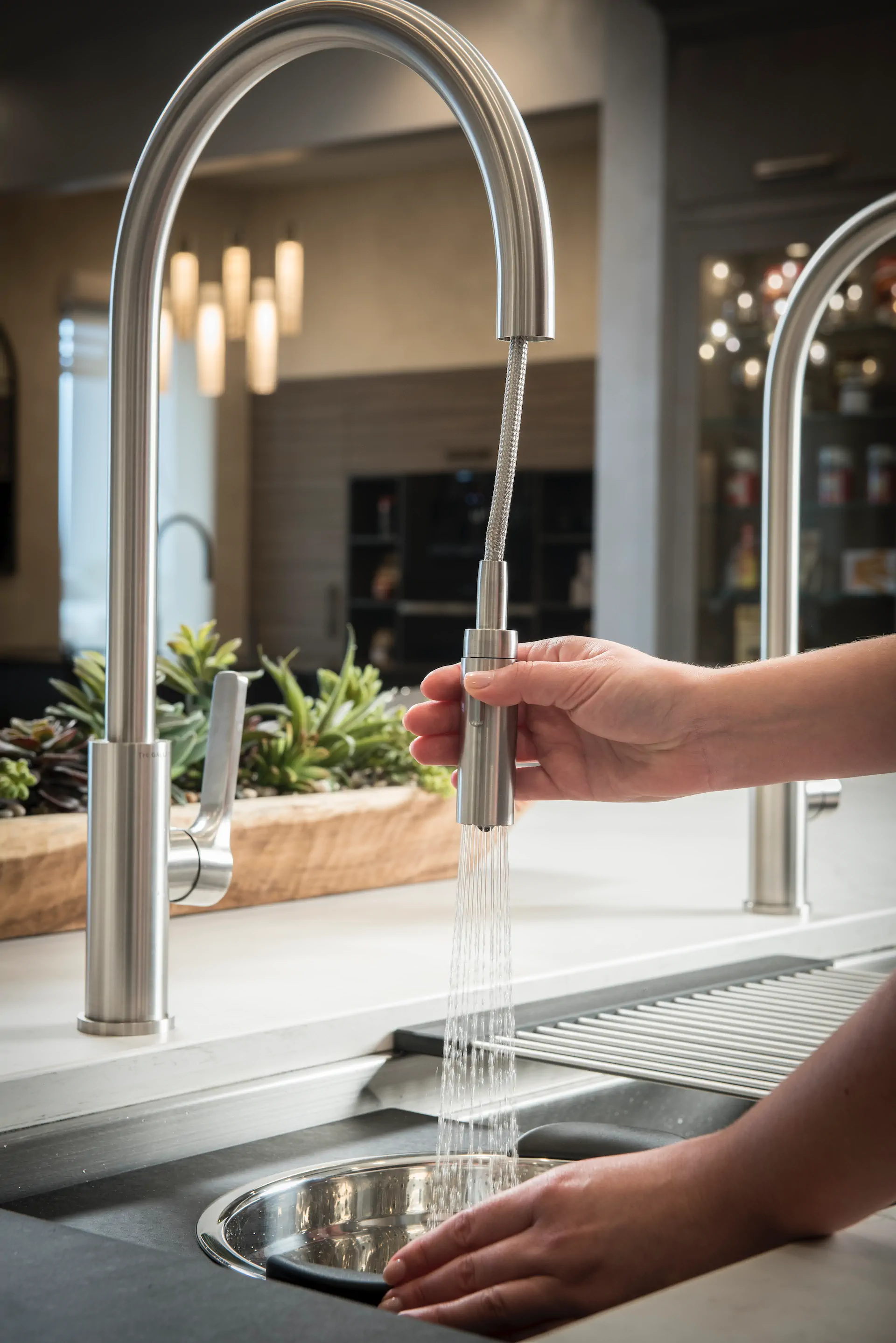 The Galley Tap installed with a kitchen workstation